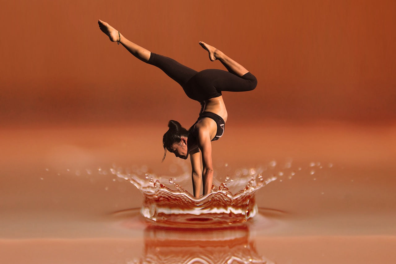 women finding balance doing yoga 