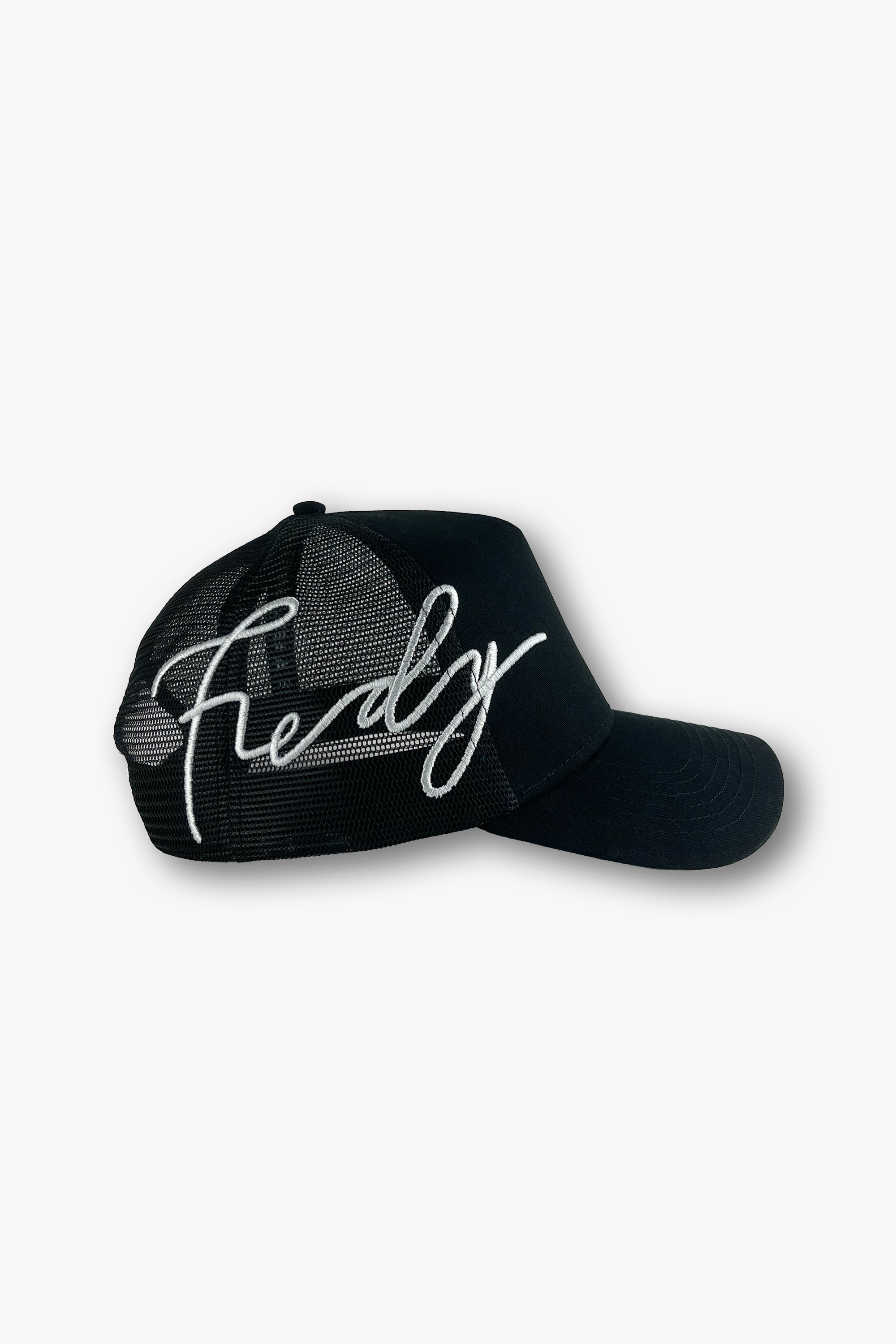 black designer trucker hat side view
