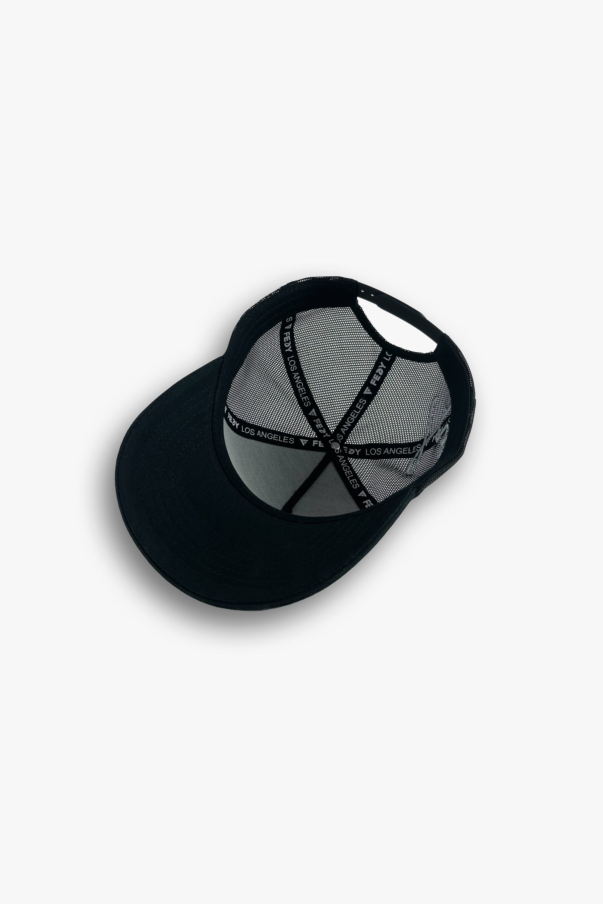 black designer trucker hat custom taping