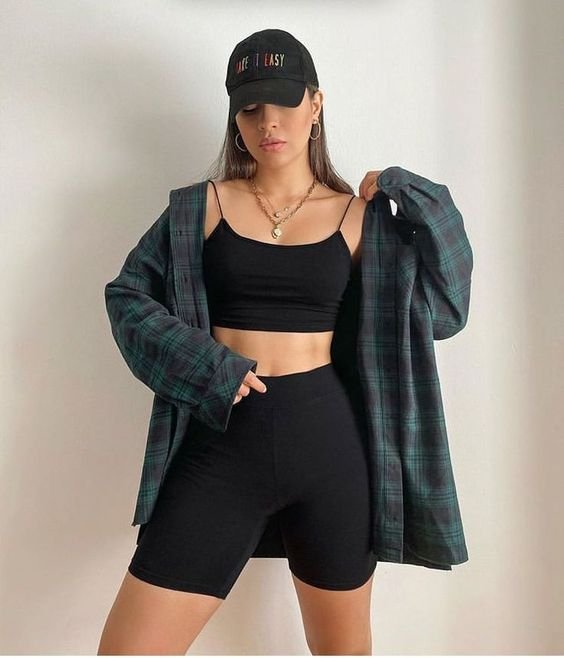 women in biker shorts outfit