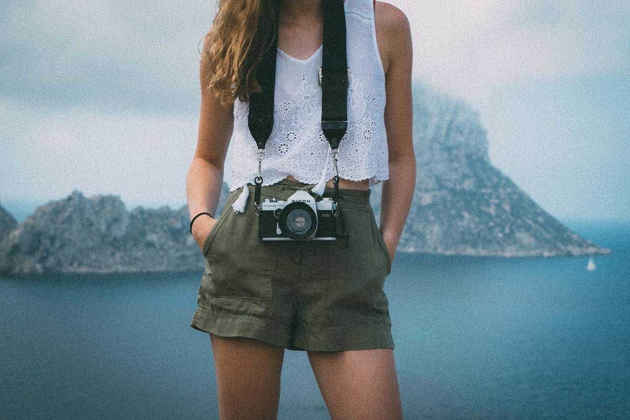 woman wearing crop top while hiking