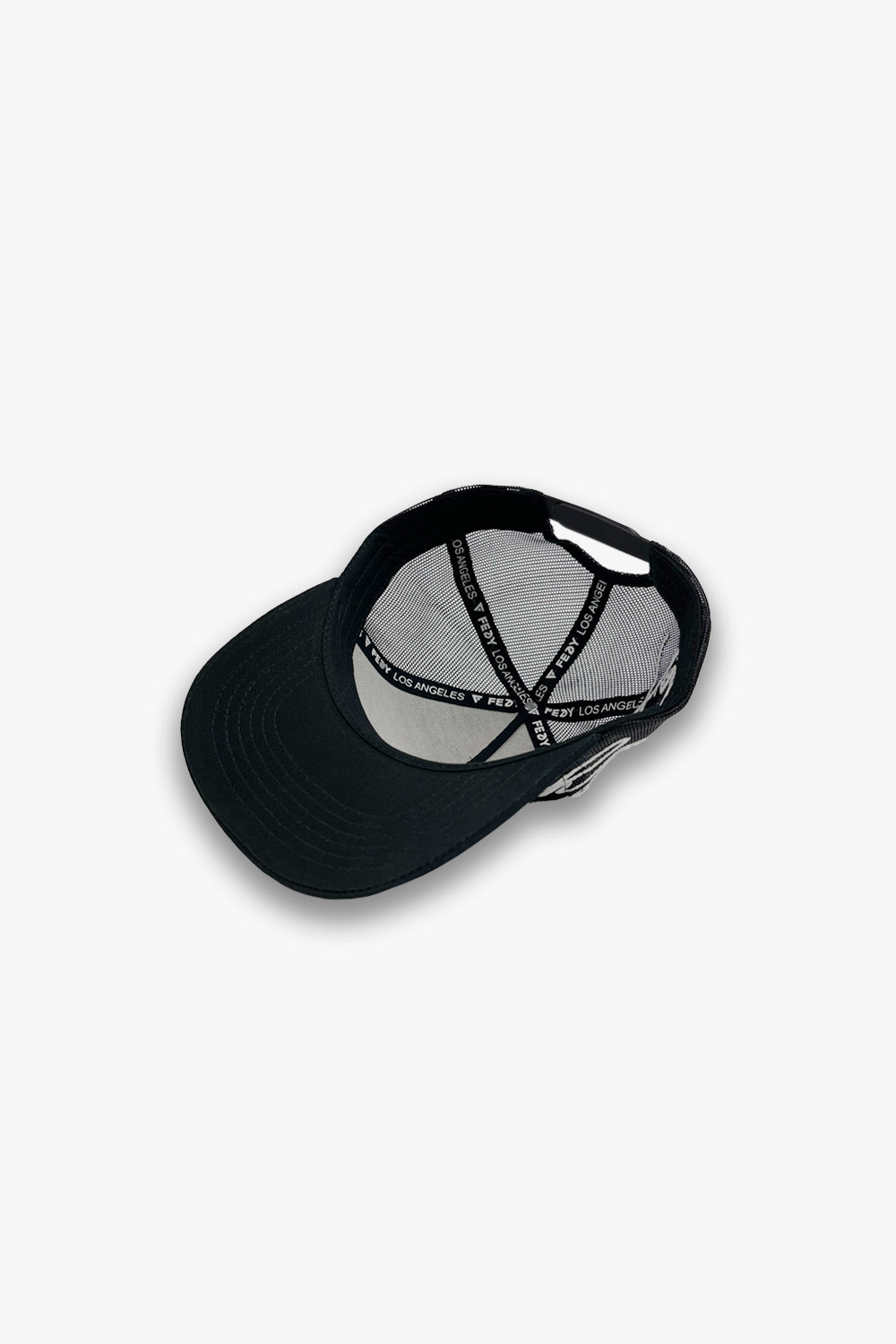 black designer trucker hat custom taping